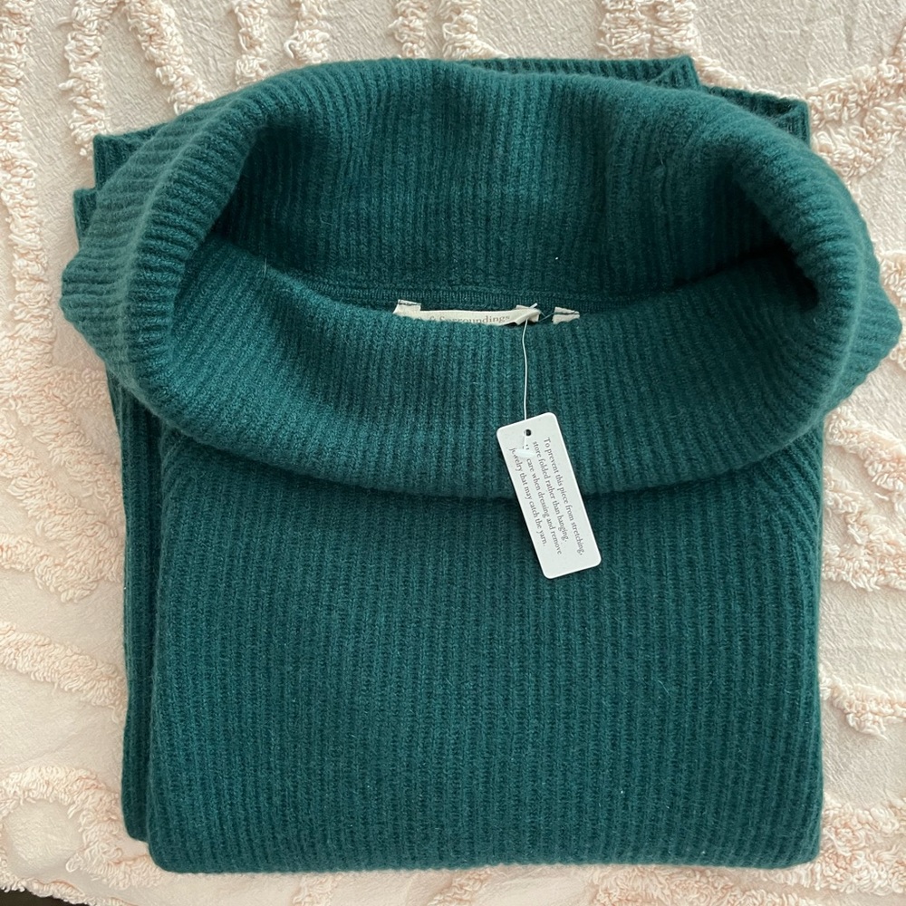 Cowl neck sweater.